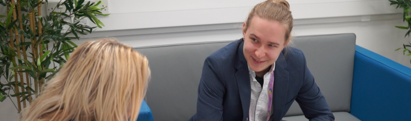 AAT Foundation Accounting student standing in a college classroom