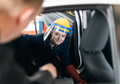 Male Engineering student Working In Workshop