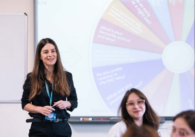 Female Teaching And Assessing CPD Student Teaching A Class Of Students