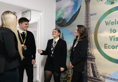 Wirral Met Travel and tourism students at an airport wearing hi-vis vests